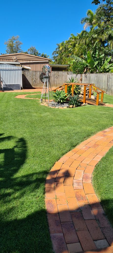 Orange brick path with healthy surrounding lawn | featured image for Daniel - Victoria Point.